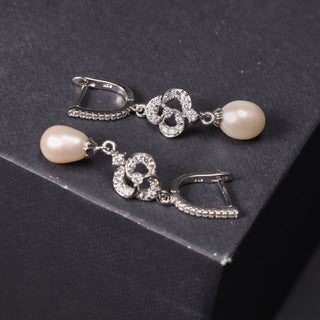 Handing Pearl on a Zircon Spiral  - Pendant and Earrings